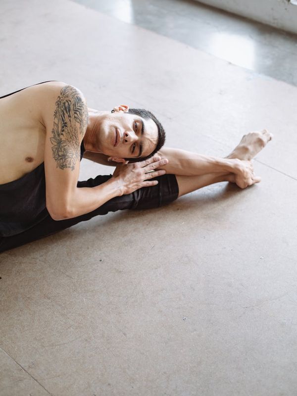 Athletic man focusing on his posture and movement control